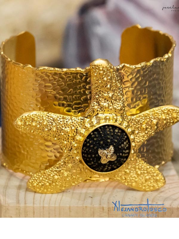 Brazalete estrella dorado erizo negro